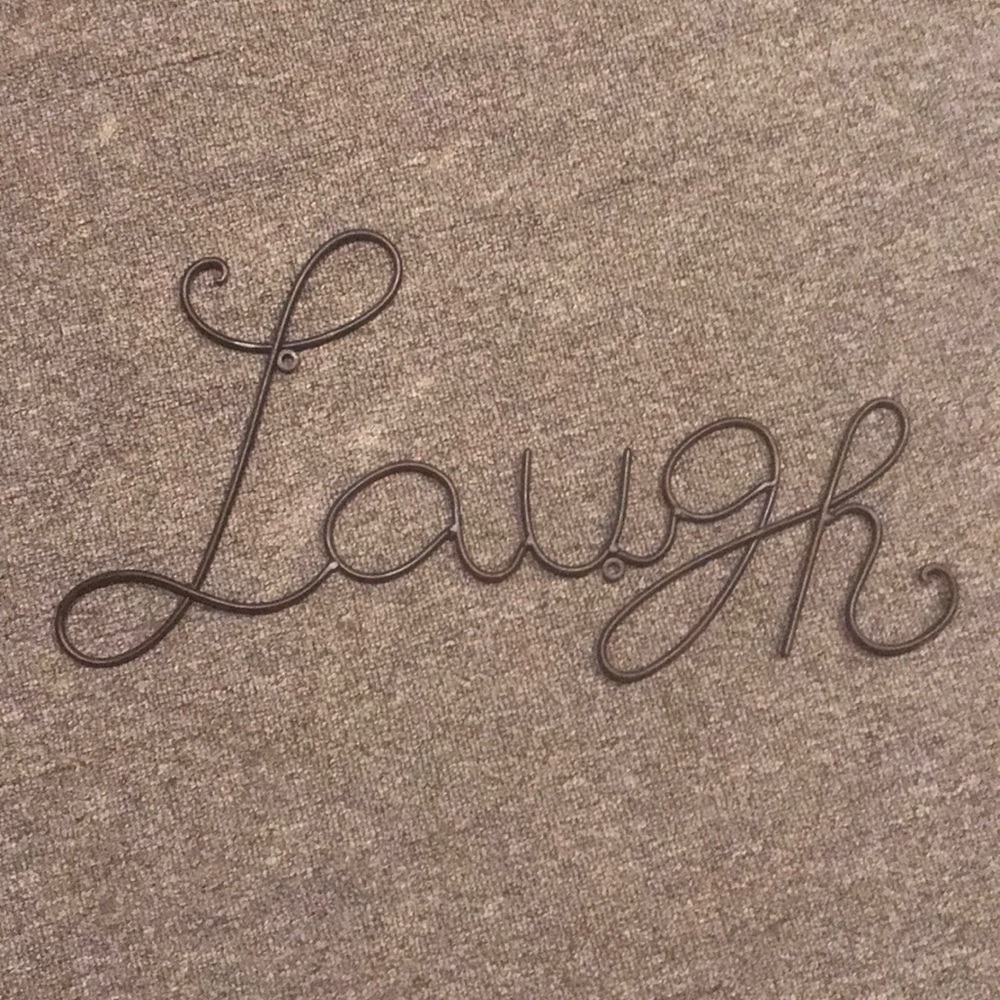 “Laugh” Wrought-Iron Wall Hang